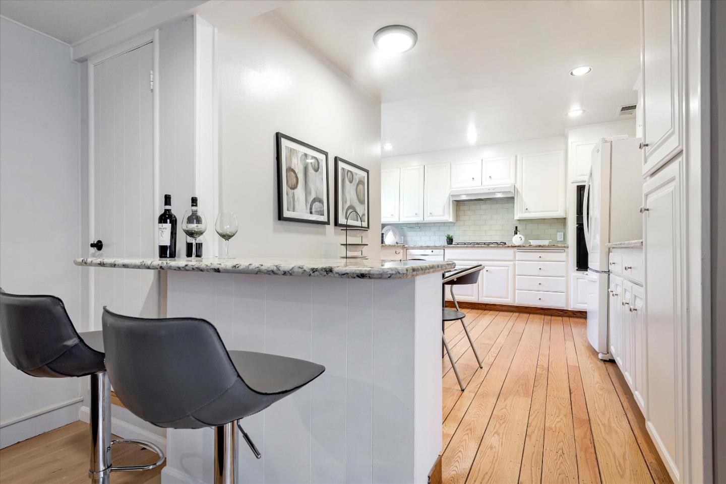 1649 Lee Drive Mountain View, CA 94040 - Photo 15 of 35 a kitchen with stainless steel appliances granite countertop a sink and a refrigerator