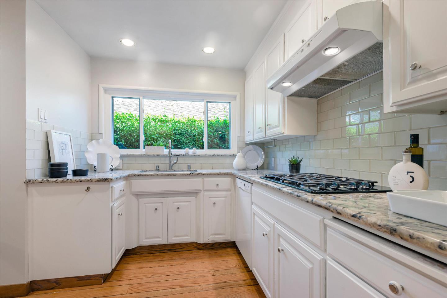 1649 Lee Drive Mountain View, CA 94040 - Photo 16 of 35 a kitchen with a sink stove and cabinets