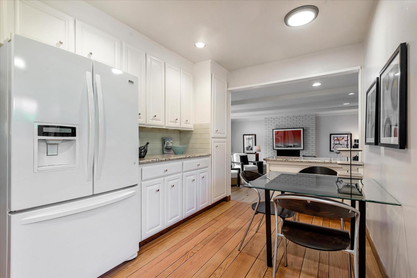 1649 Lee Drive Mountain View, CA 94040 - Photo 19 of 35 a kitchen with stainless steel appliances a stove a sink and a refrigerator
