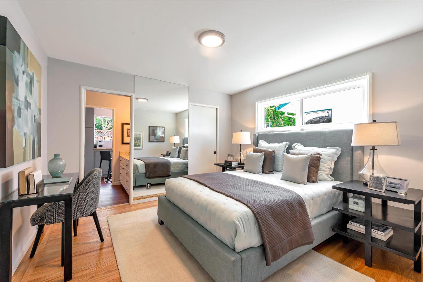 1649 Lee Drive Mountain View, CA 94040 - Photo 24 of 35 a bedroom with a bed and wooden floor