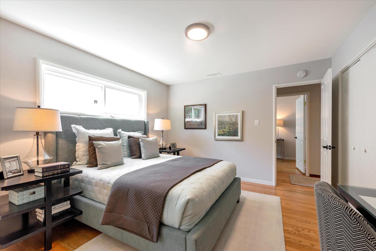 1649 Lee Drive Mountain View, CA 94040 - Photo 26 of 35 a bedroom with a bed and a night stand