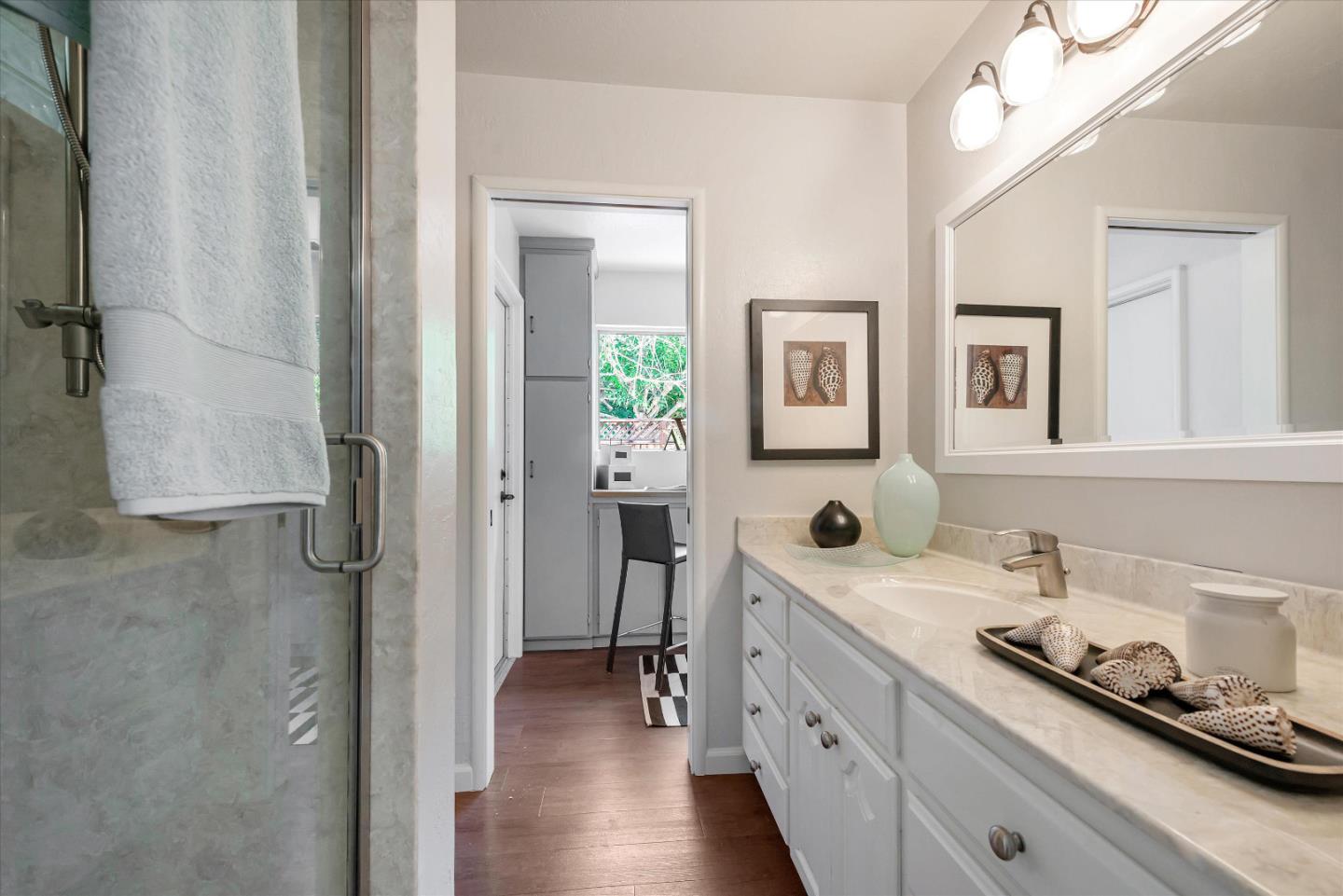 1649 Lee Drive Mountain View, CA 94040 - Photo 28 of 35 a bathroom with a double vanity sink mirror and shower