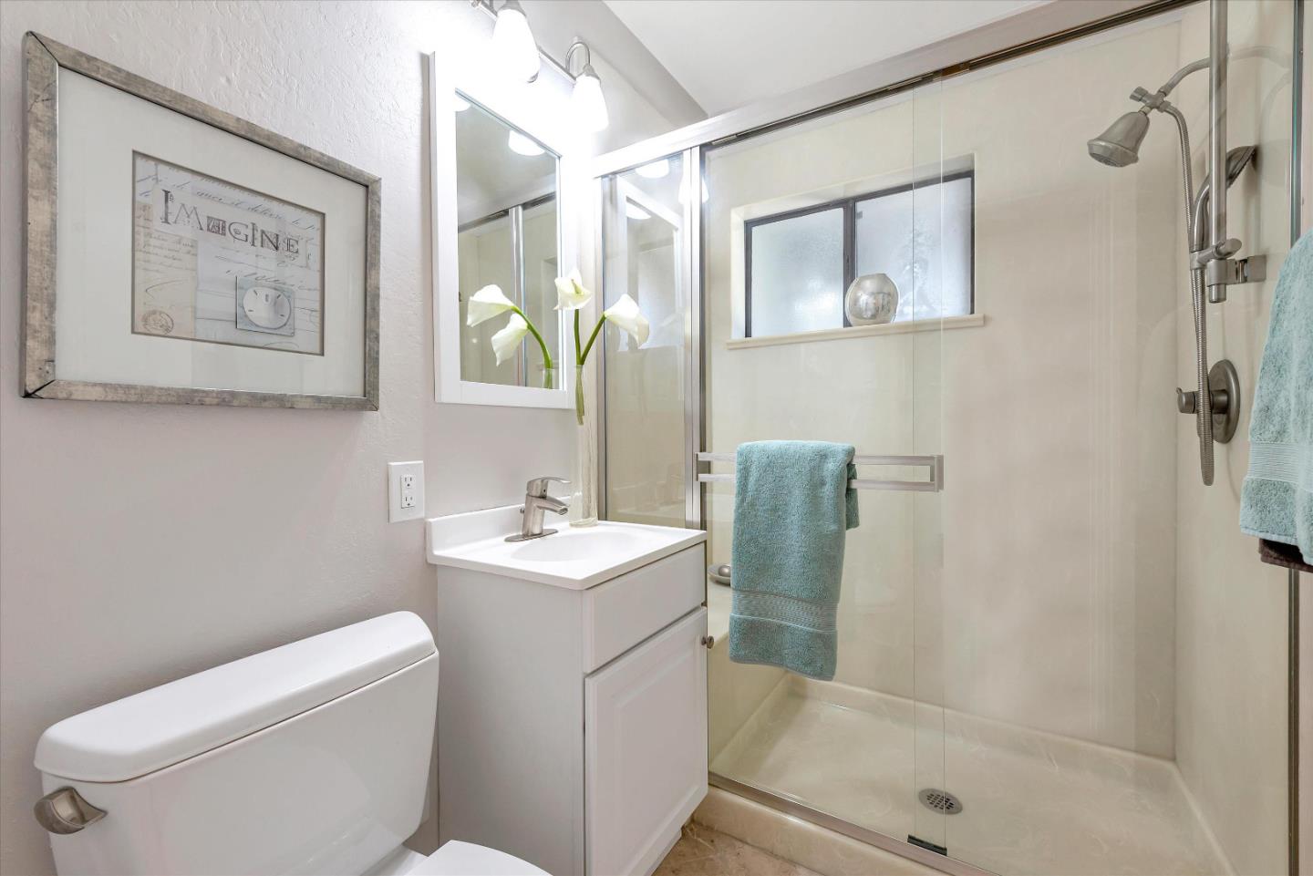 1649 Lee Drive Mountain View, CA 94040 - Photo 29 of 35 a bathroom with a toilet sink and mirror