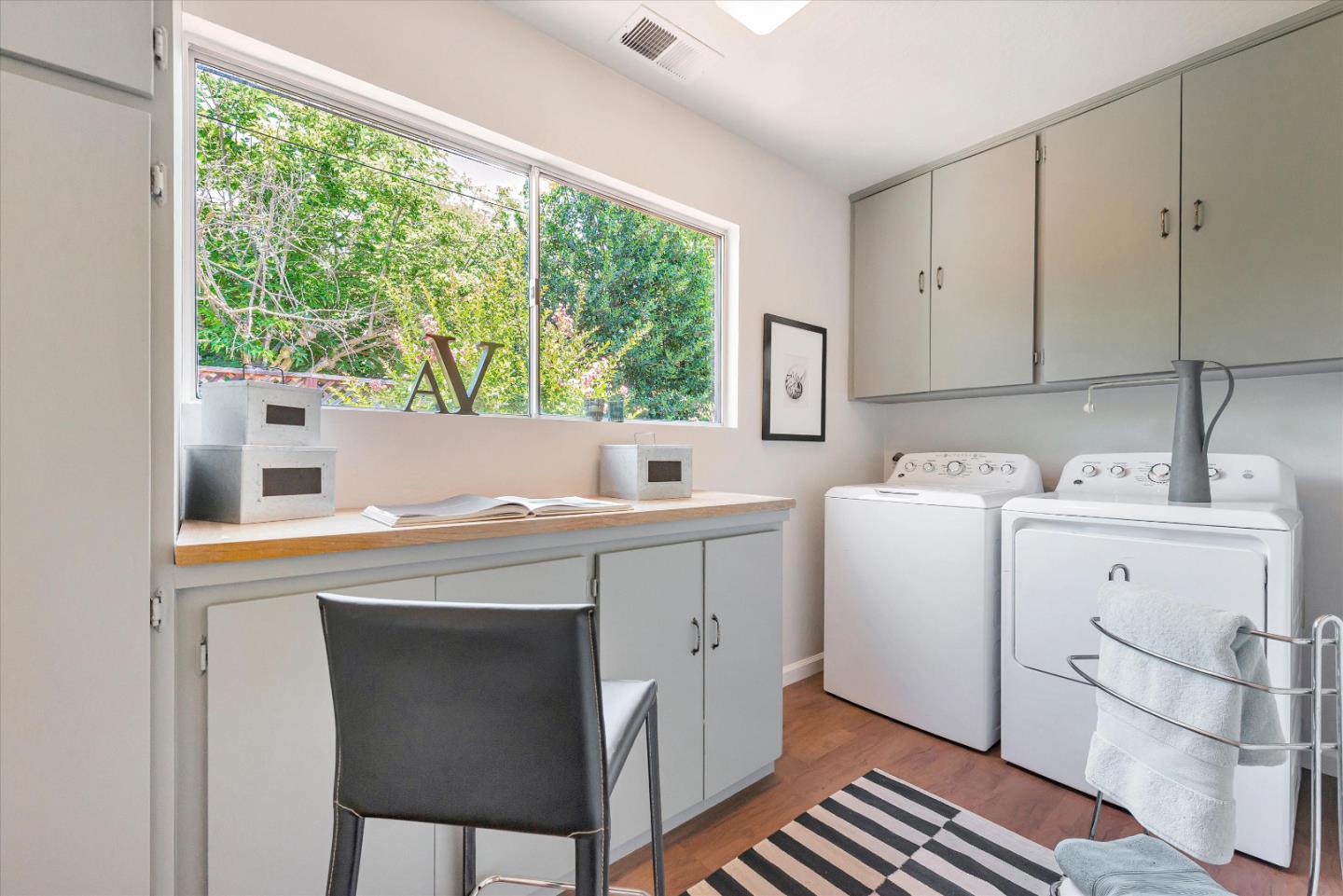 1649 Lee Drive Mountain View, CA 94040 - Photo 31 of 35 a view of cabinets a sink and a window in a room