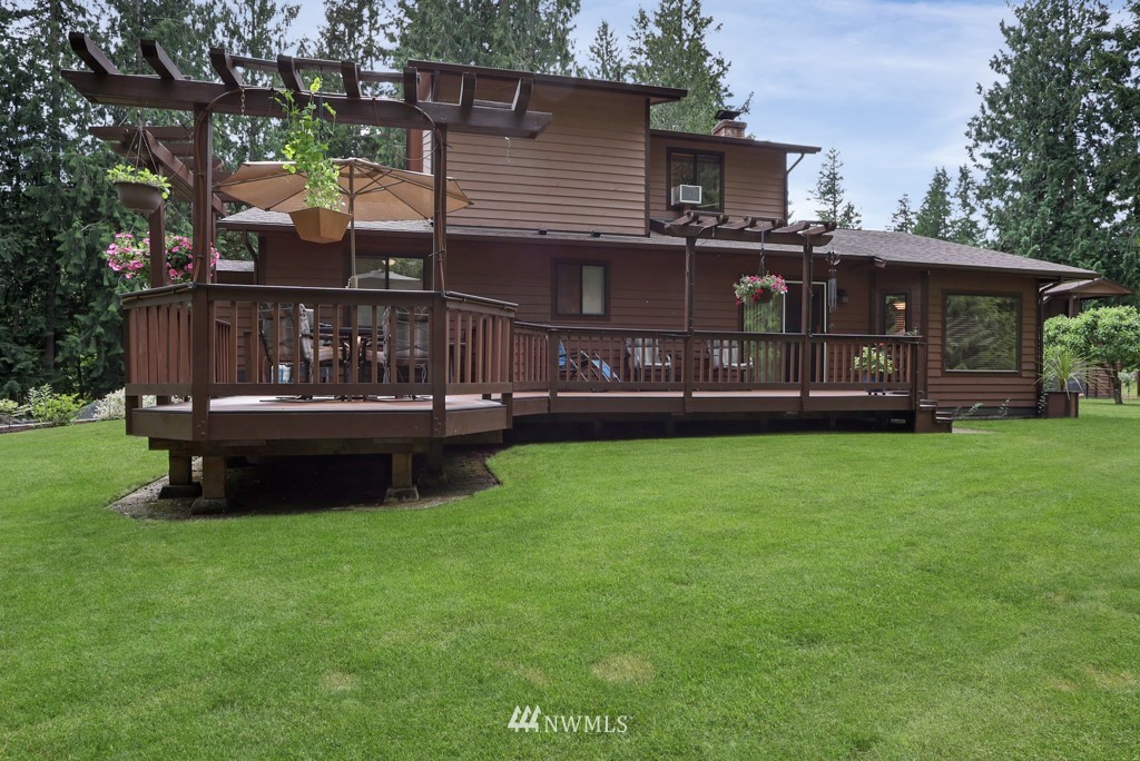 25308 Brooks Road East Orting, WA 98360 - Photo 11 of 40 a view of a house with a yard