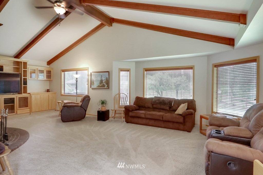 25308 Brooks Road East Orting, WA 98360 - Photo 15 of 40 a living room with furniture and a large window