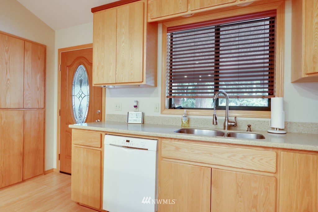 25308 Brooks Road East Orting, WA 98360 - Photo 21 of 40 a kitchen with a sink cabinets and a window