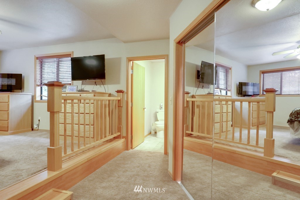 25308 Brooks Road East Orting, WA 98360 - Photo 26 of 40 a living room with furniture and a flat screen tv