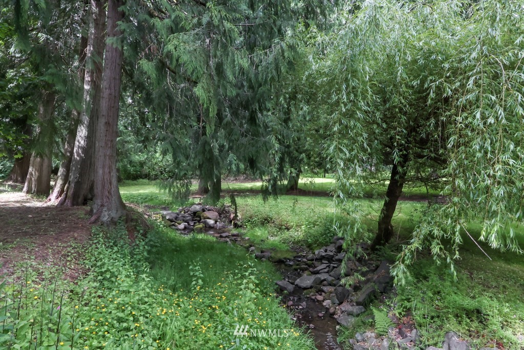 25308 Brooks Road East Orting, WA 98360 - Photo 31 of 40 a view of a garden with a tree