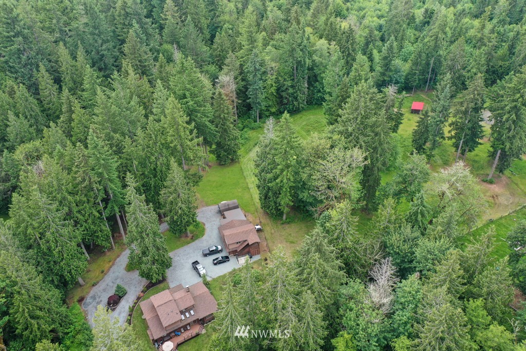25308 Brooks Road East Orting, WA 98360 - Photo 35 of 40 an aerial view of a house with lots of trees