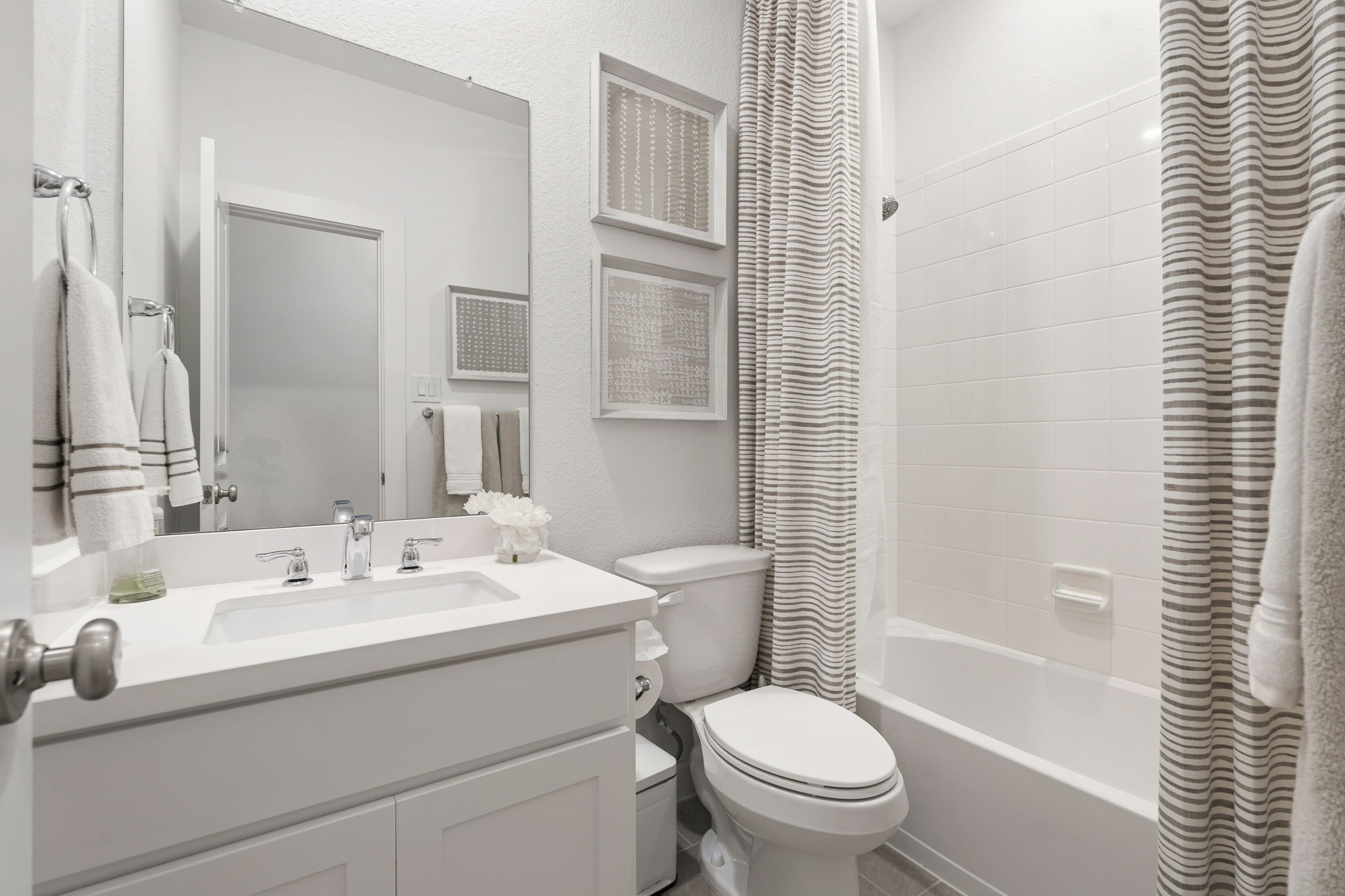 8113 Triumph Bend Way Magnolia, TX 77354 - Photo 22 of 33 a bathroom with a sink toilet and shower