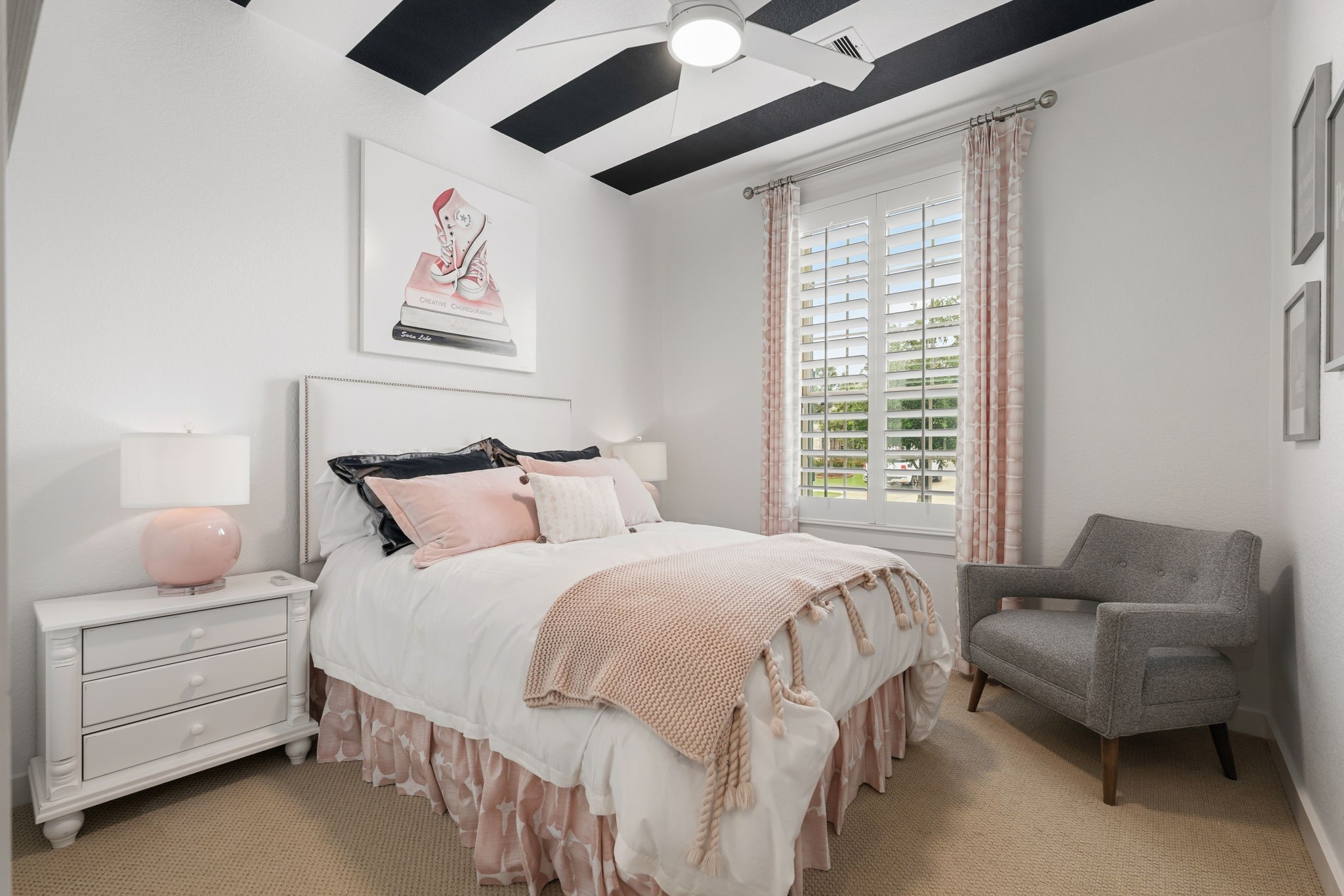 8113 Triumph Bend Way Magnolia, TX 77354 - Photo 23 of 33 a bedroom with bed and a couch