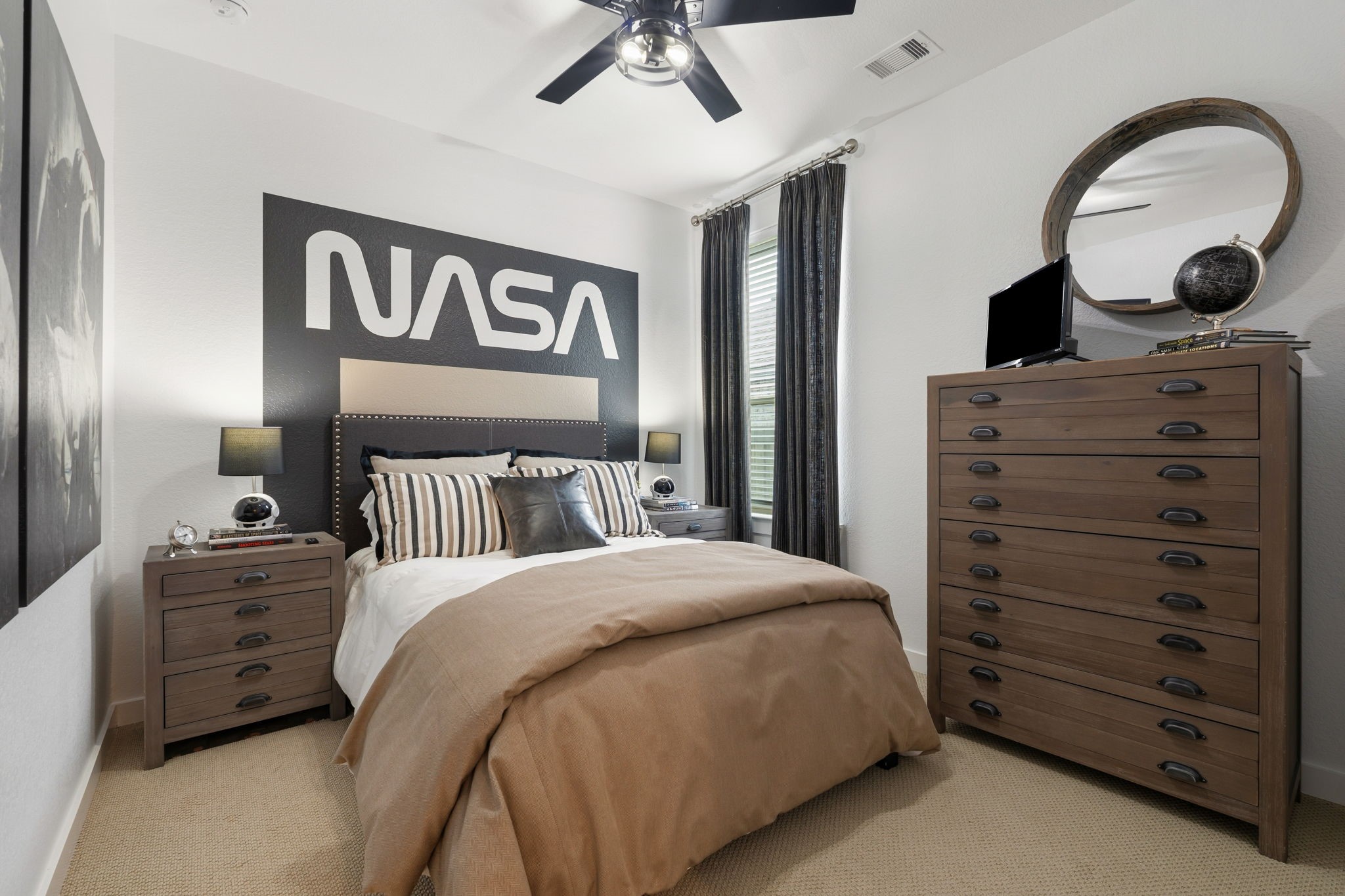 8113 Triumph Bend Way Magnolia, TX 77354 - Photo 24 of 33 a bedroom with a bed and a dresser