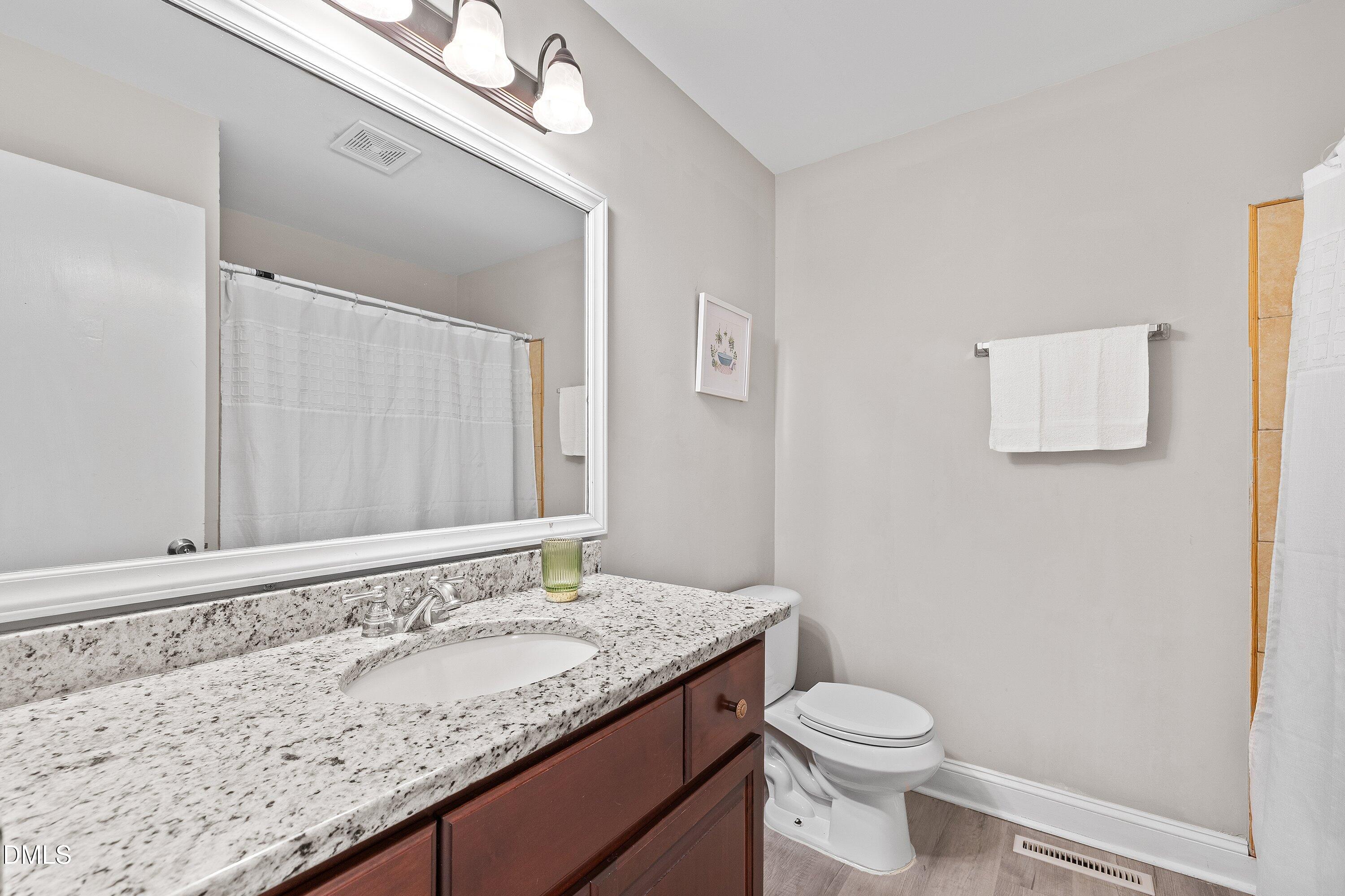 1924 Snow Hill Road Durham, NC 27712 - Photo 12 of 14 hallway full bath