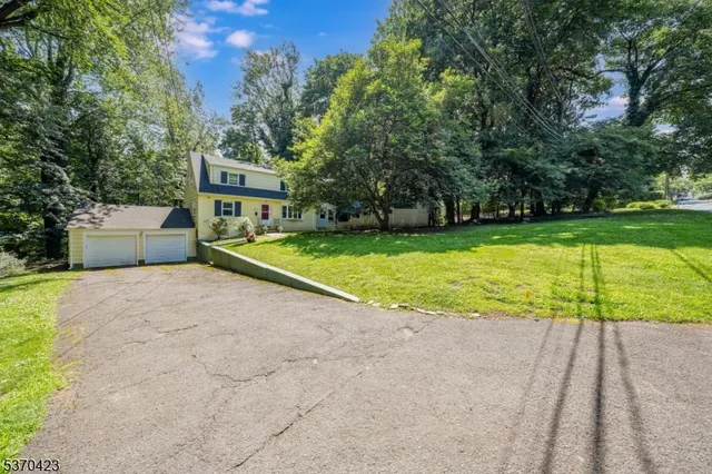 a view of a house with swimming pool