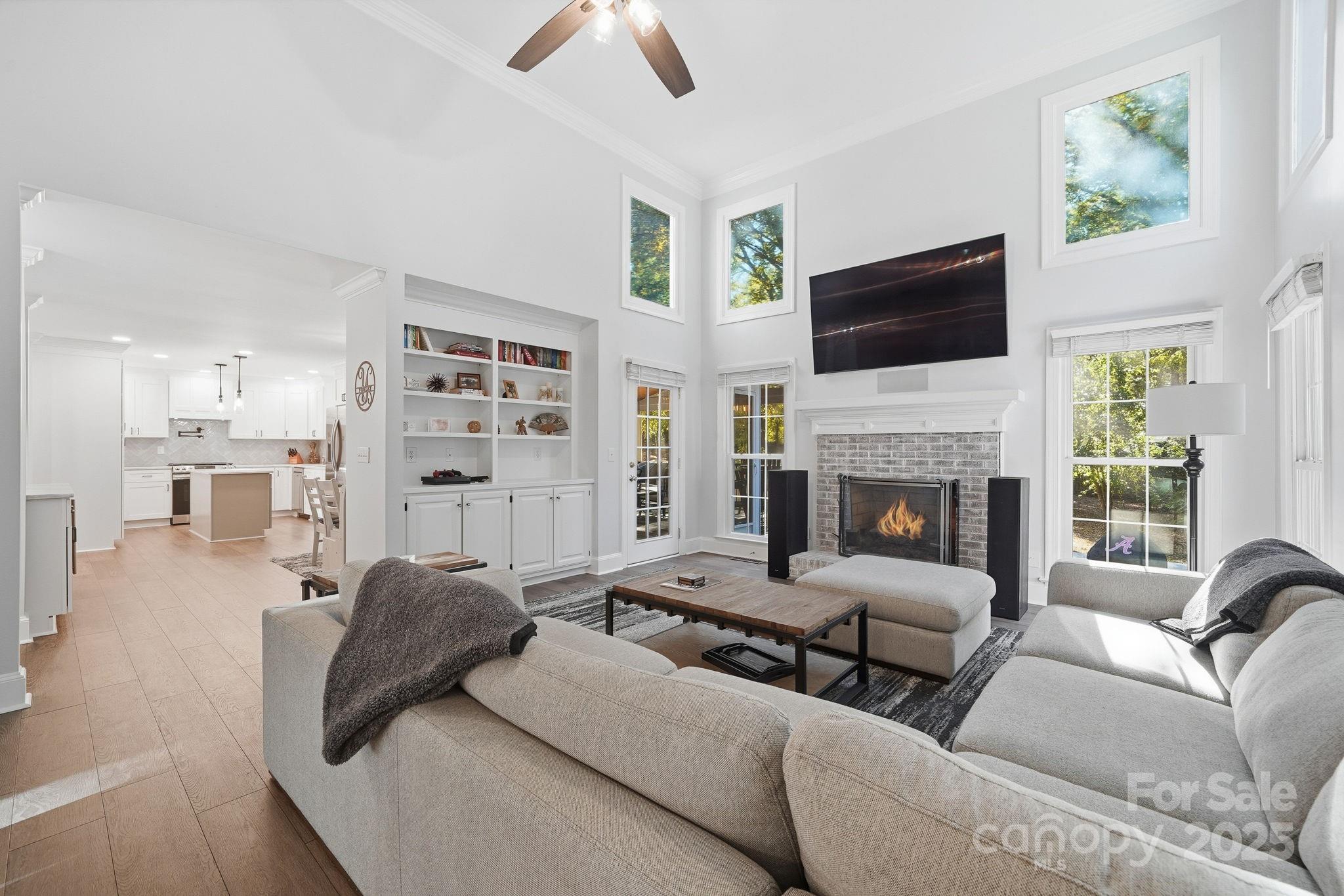 6600 Shaftesbury Road Charlotte, NC 28270 - Photo 11 of 42 a living room with furniture fireplace and flat screen tv