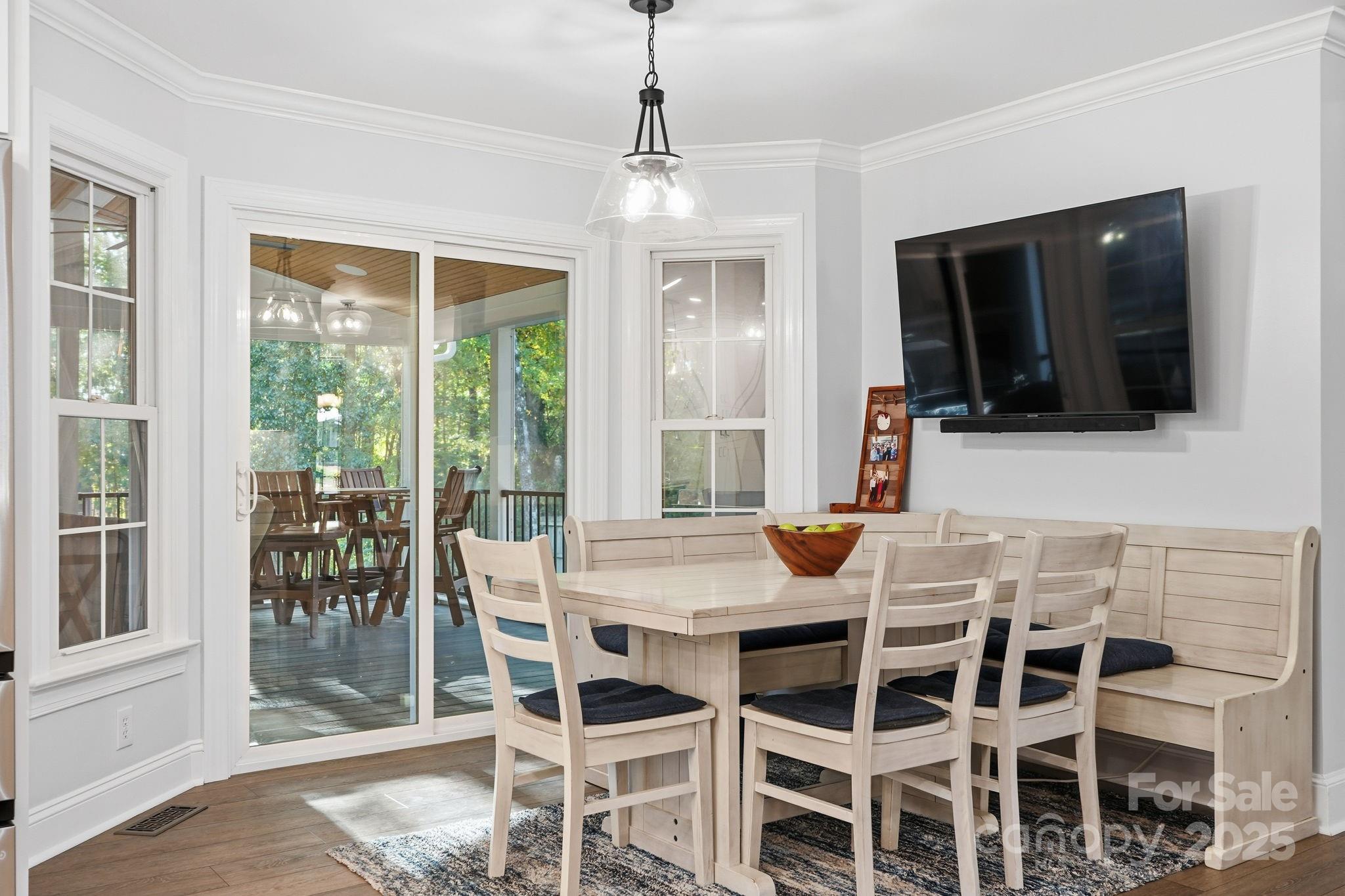 6600 Shaftesbury Road Charlotte, NC 28270 - Photo 17 of 42 a dining room with furniture window and wooden floor
