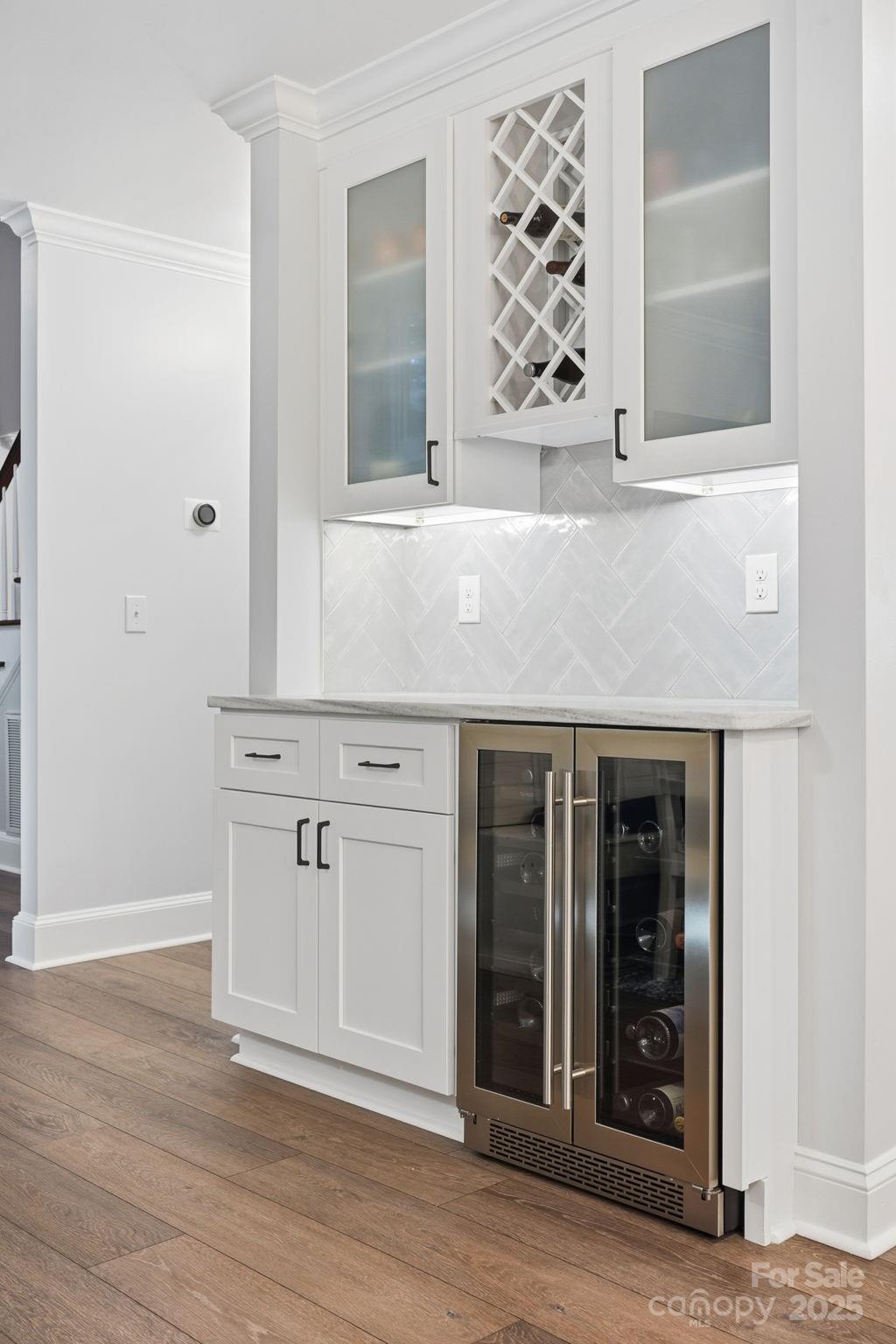 6600 Shaftesbury Road Charlotte, NC 28270 - Photo 19 of 42 an entryway with wooden floor