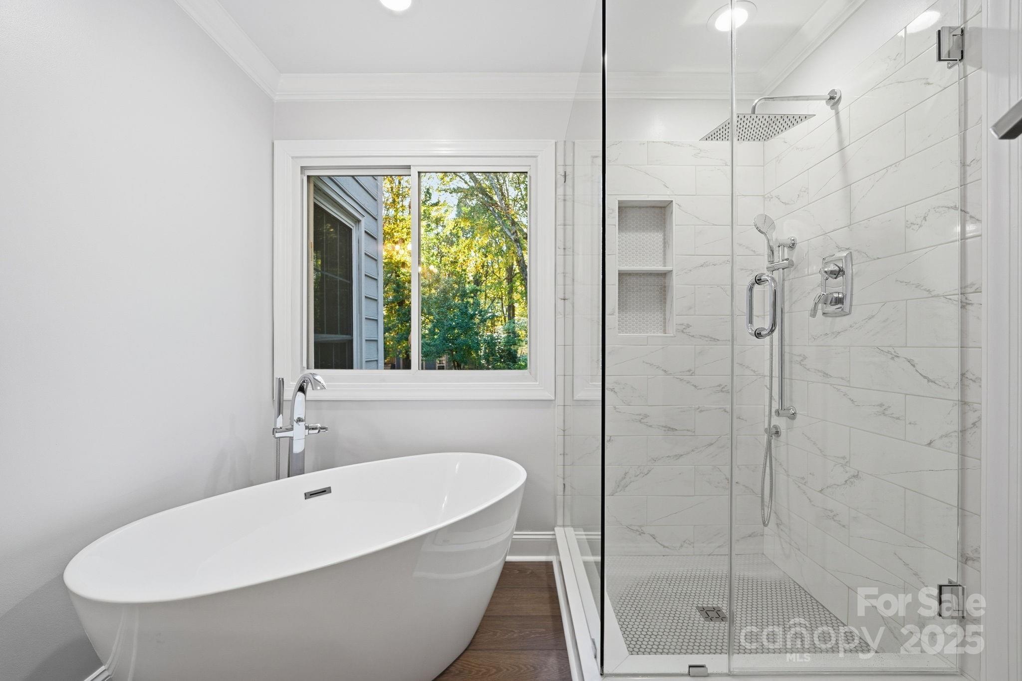 6600 Shaftesbury Road Charlotte, NC 28270 - Photo 26 of 42 a bathroom with a bathtub and shower