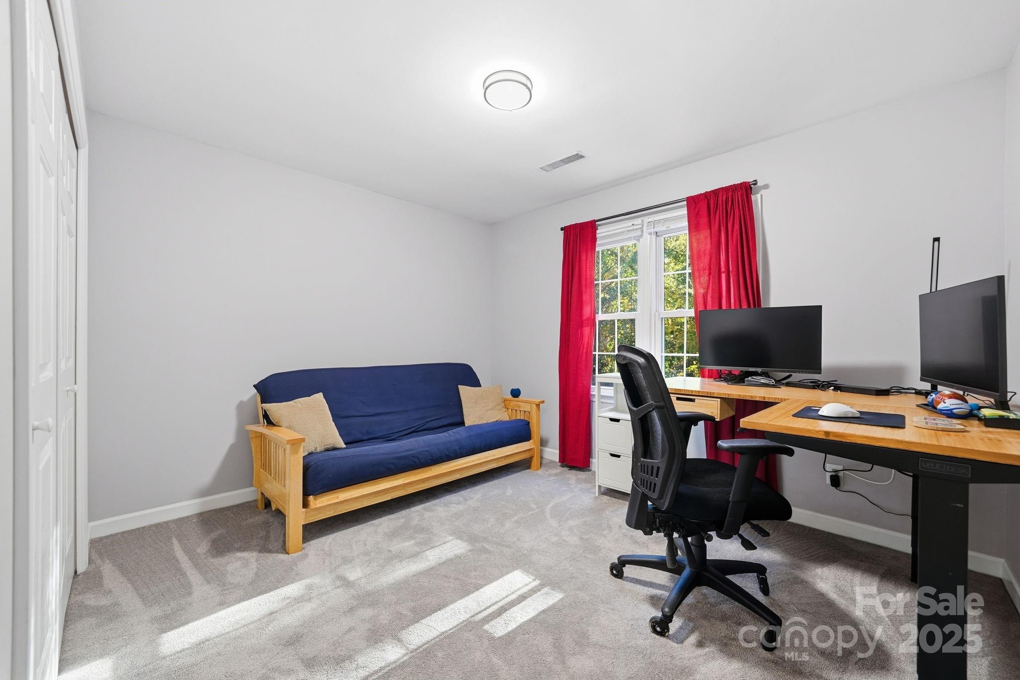6600 Shaftesbury Road Charlotte, NC 28270 - Photo 29 of 42 a view of a workspace with furniture and a window