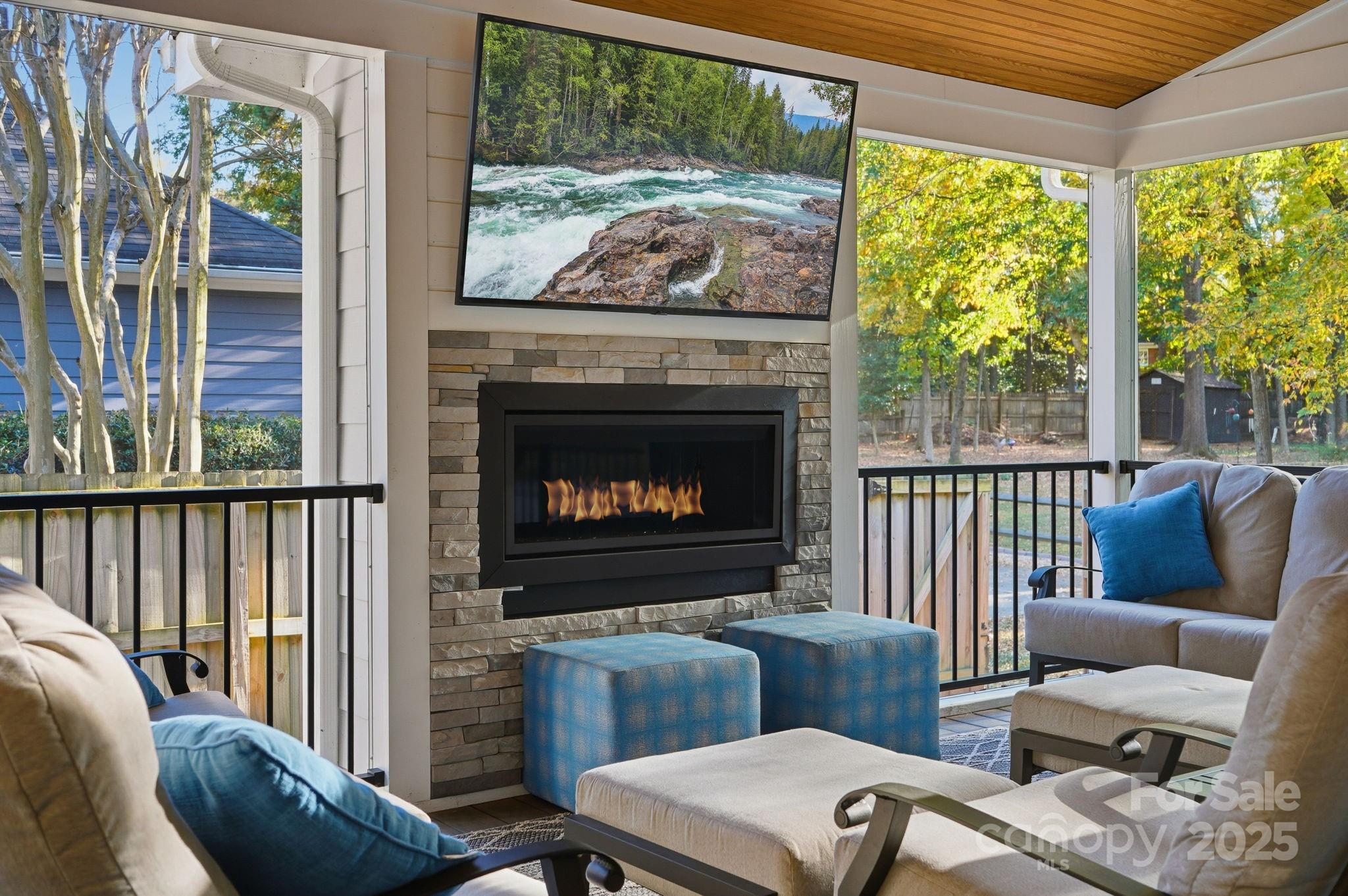6600 Shaftesbury Road Charlotte, NC 28270 - Photo 35 of 42 a living room with furniture and a fireplace