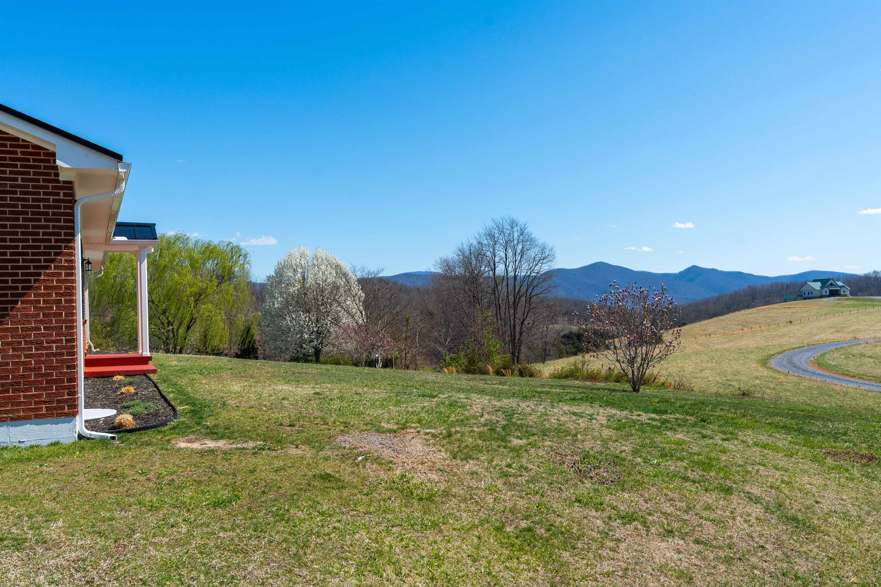 899 Timber Ridge Road Fairfield, VA 24435 - Photo 11 of 65 a big yard with lots of green space and house in the back