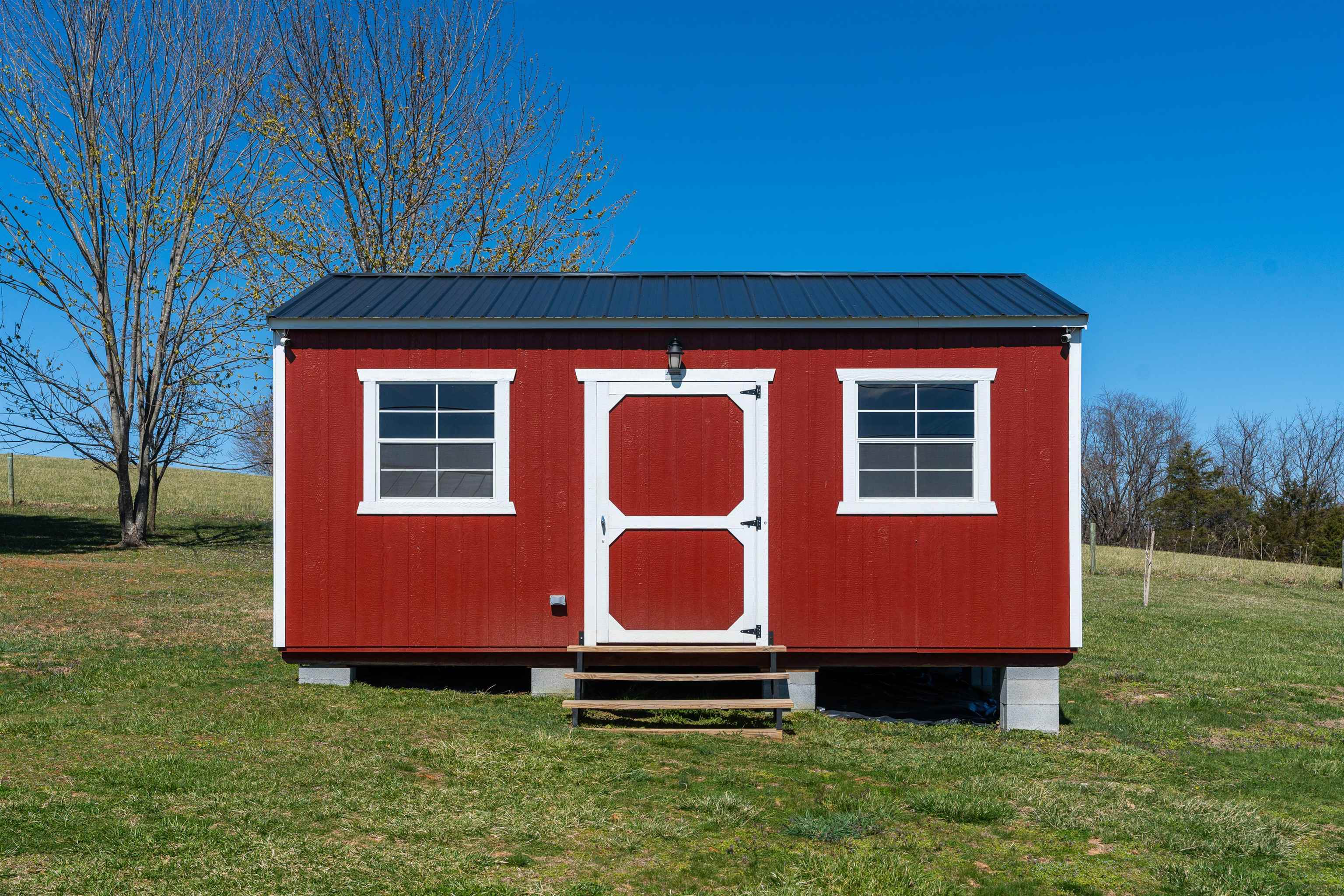 899 Timber Ridge Road Fairfield, VA 24435 - Photo 19 of 65 a front view of a house with a yard