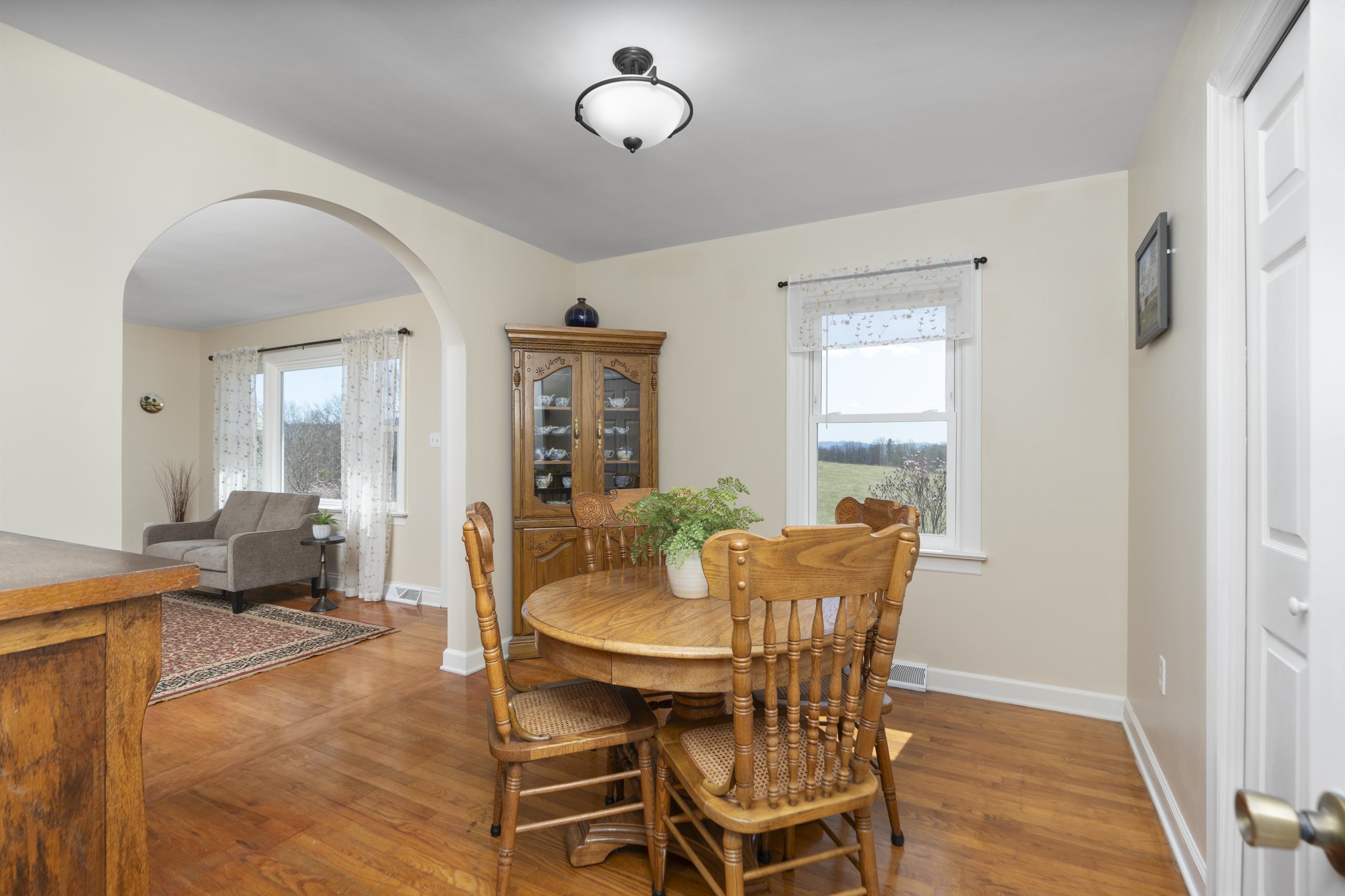 899 Timber Ridge Road Fairfield, VA 24435 - Photo 41 of 65 a view of a dining room with furniture window and wooden floor