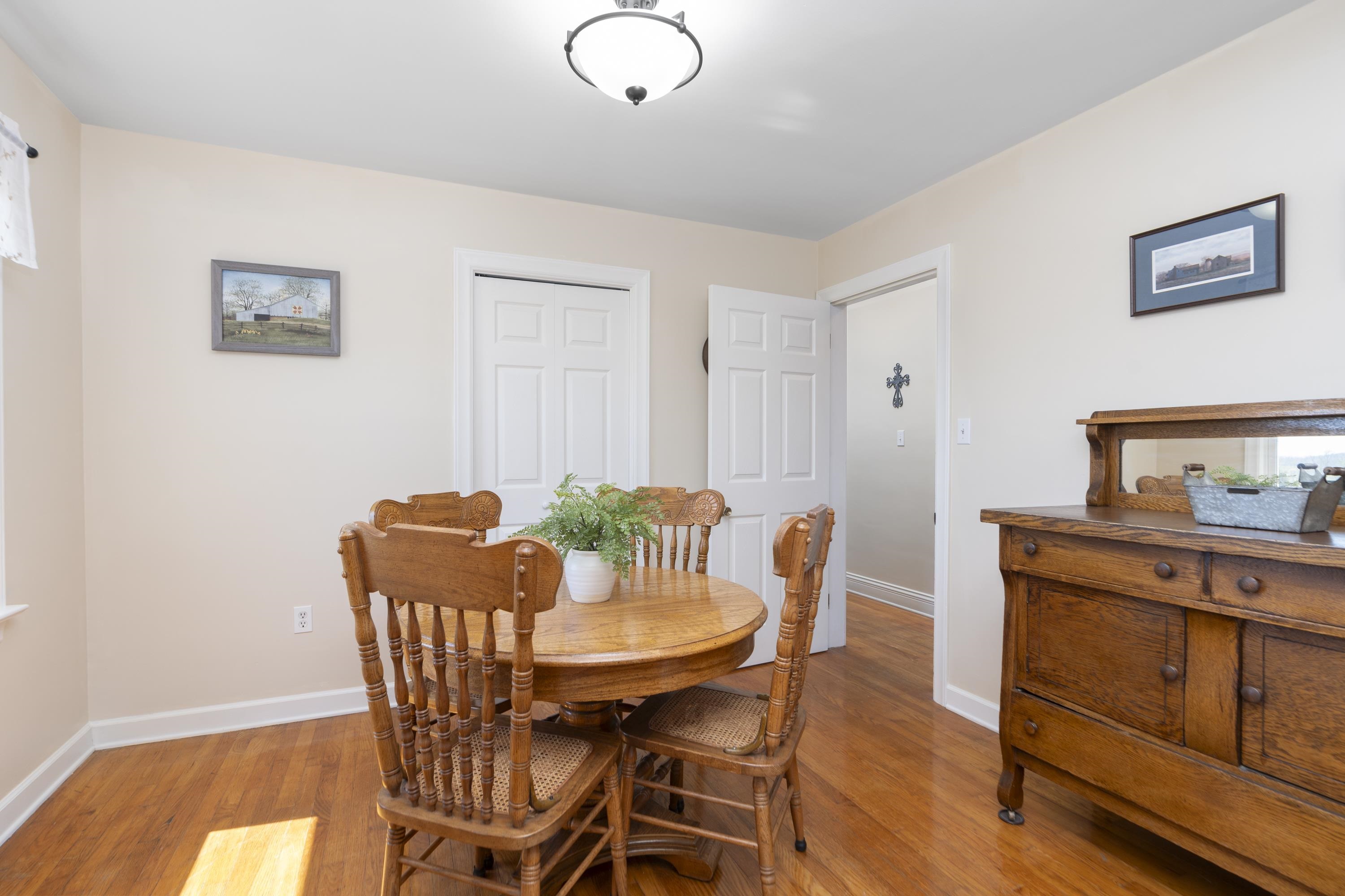 899 Timber Ridge Road Fairfield, VA 24435 - Photo 45 of 65 a view of a dining room with furniture and wooden floor