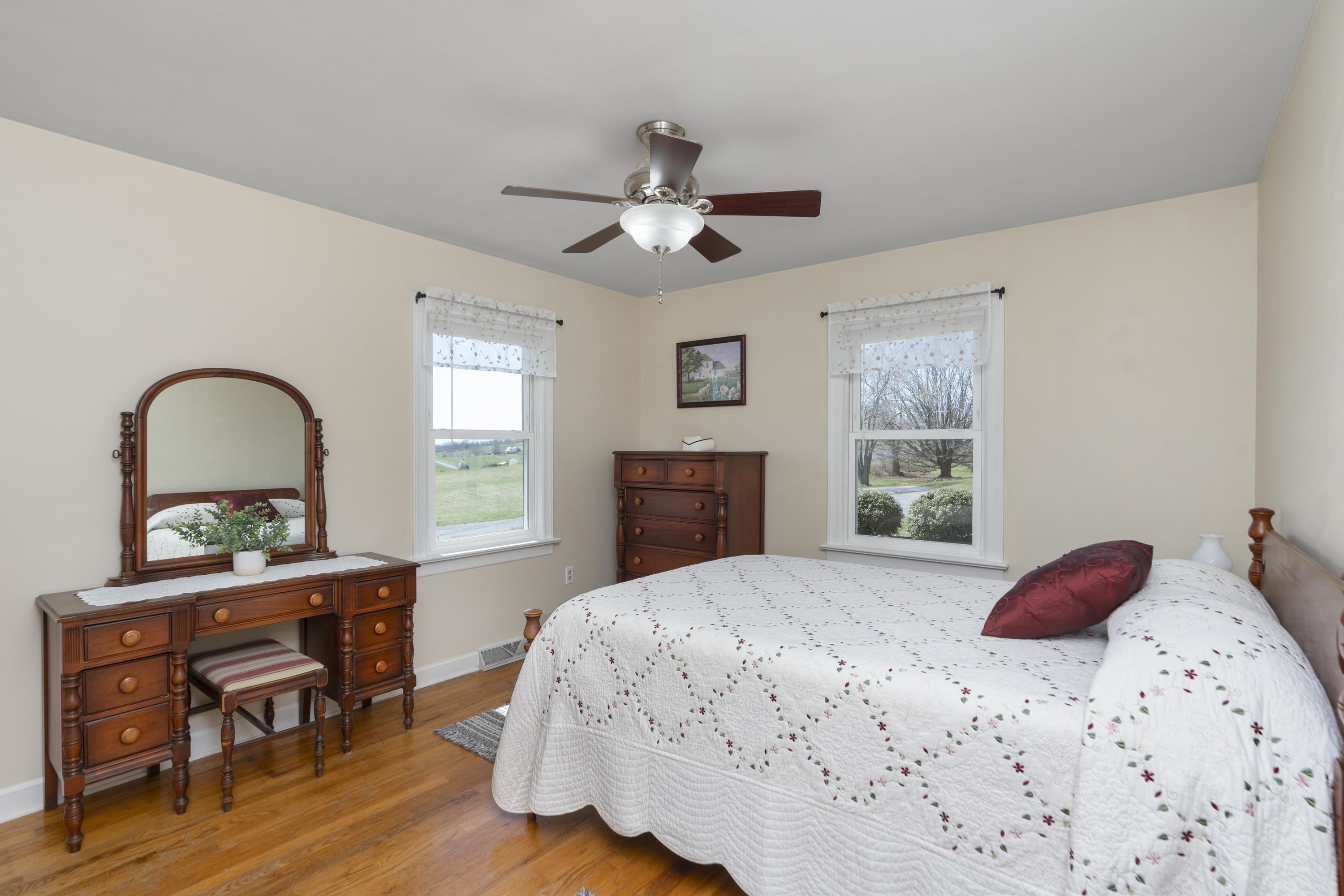 899 Timber Ridge Road Fairfield, VA 24435 - Photo 49 of 65 a bedroom with a bed and a table