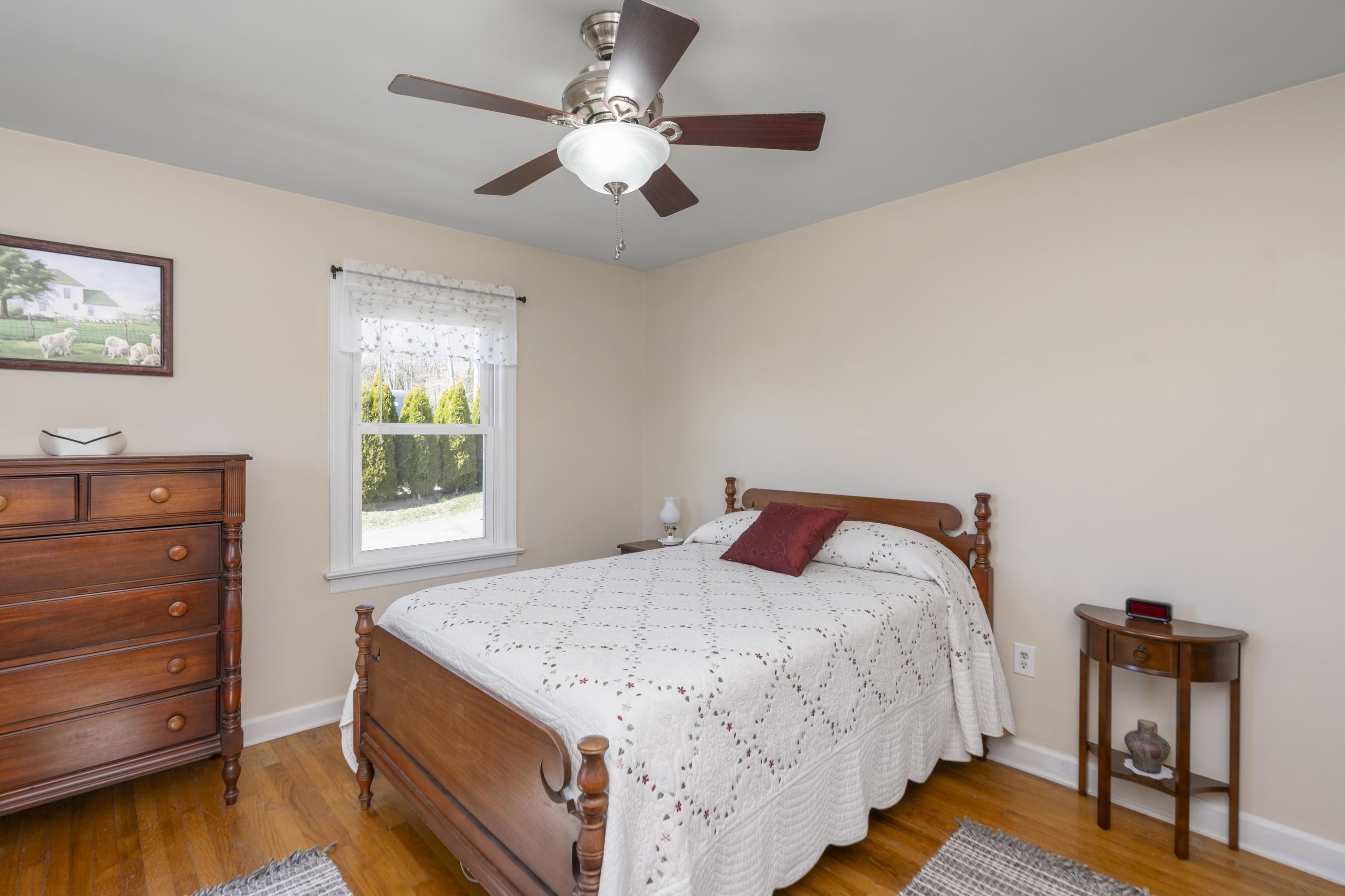 899 Timber Ridge Road Fairfield, VA 24435 - Photo 52 of 65 a bedroom with a bed and a dresser