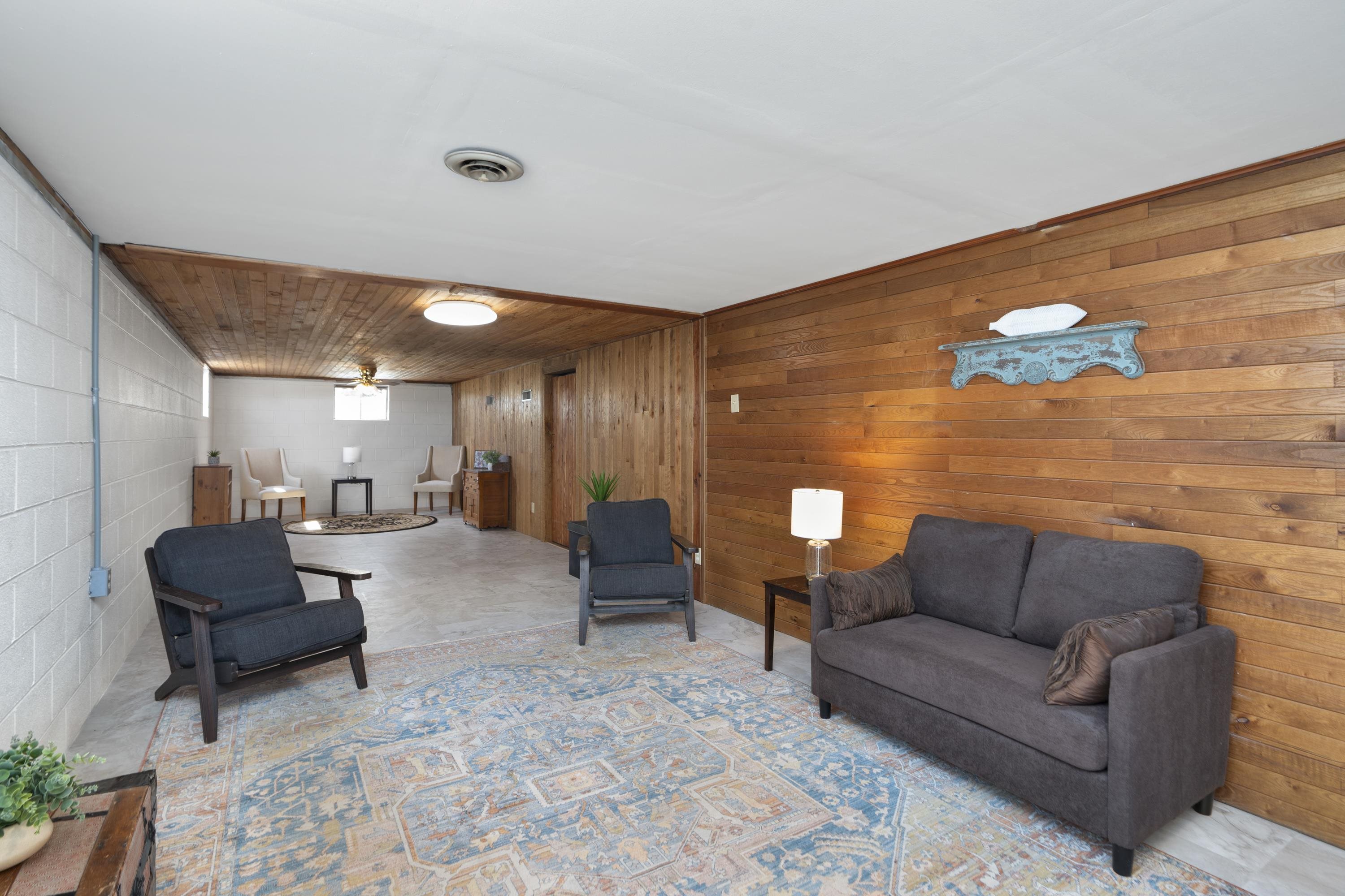 899 Timber Ridge Road Fairfield, VA 24435 - Photo 60 of 65 a living room with furniture and a potted plant