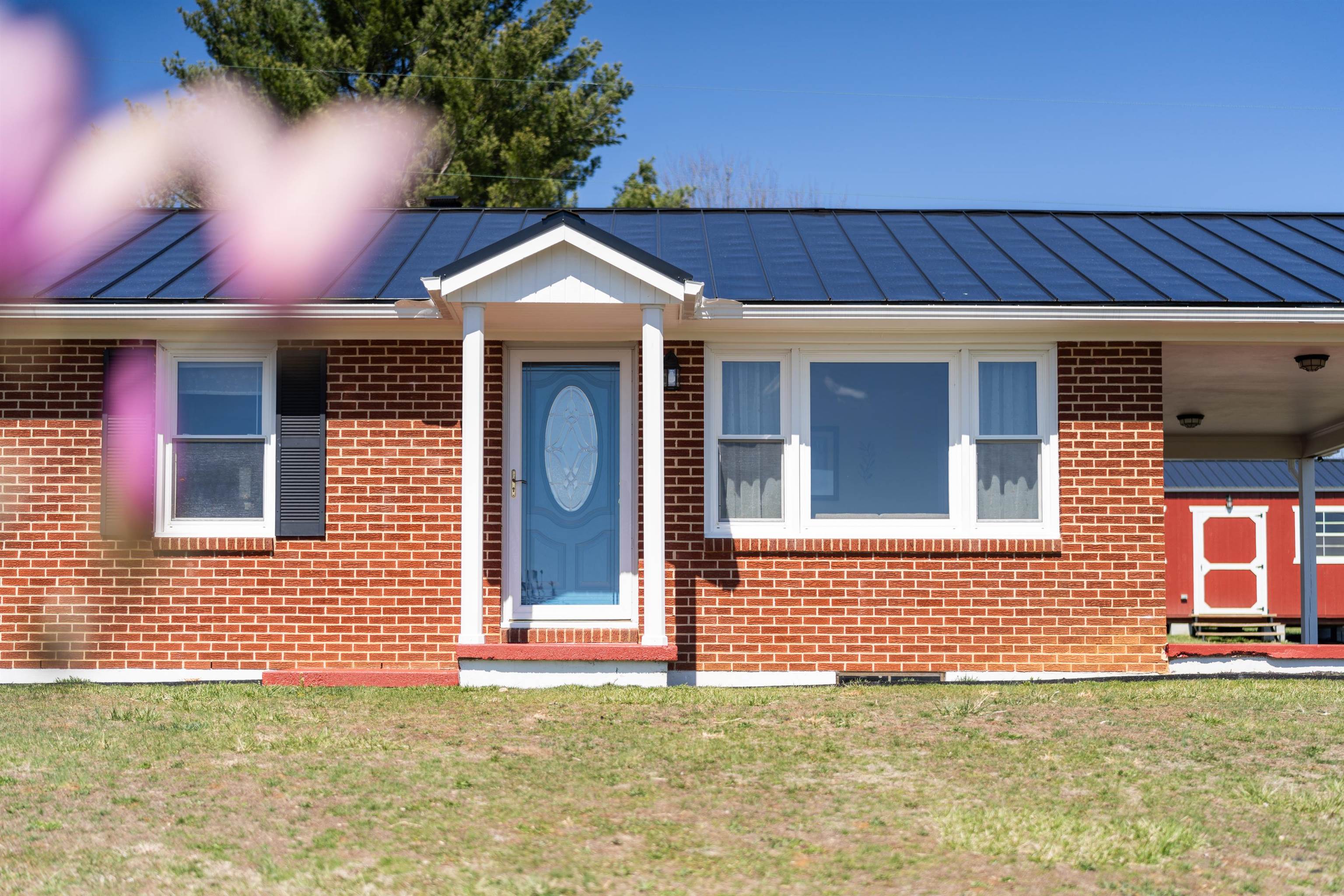 899 Timber Ridge Road Fairfield, VA 24435 - Photo 7 of 65 a front view of a house with a yard