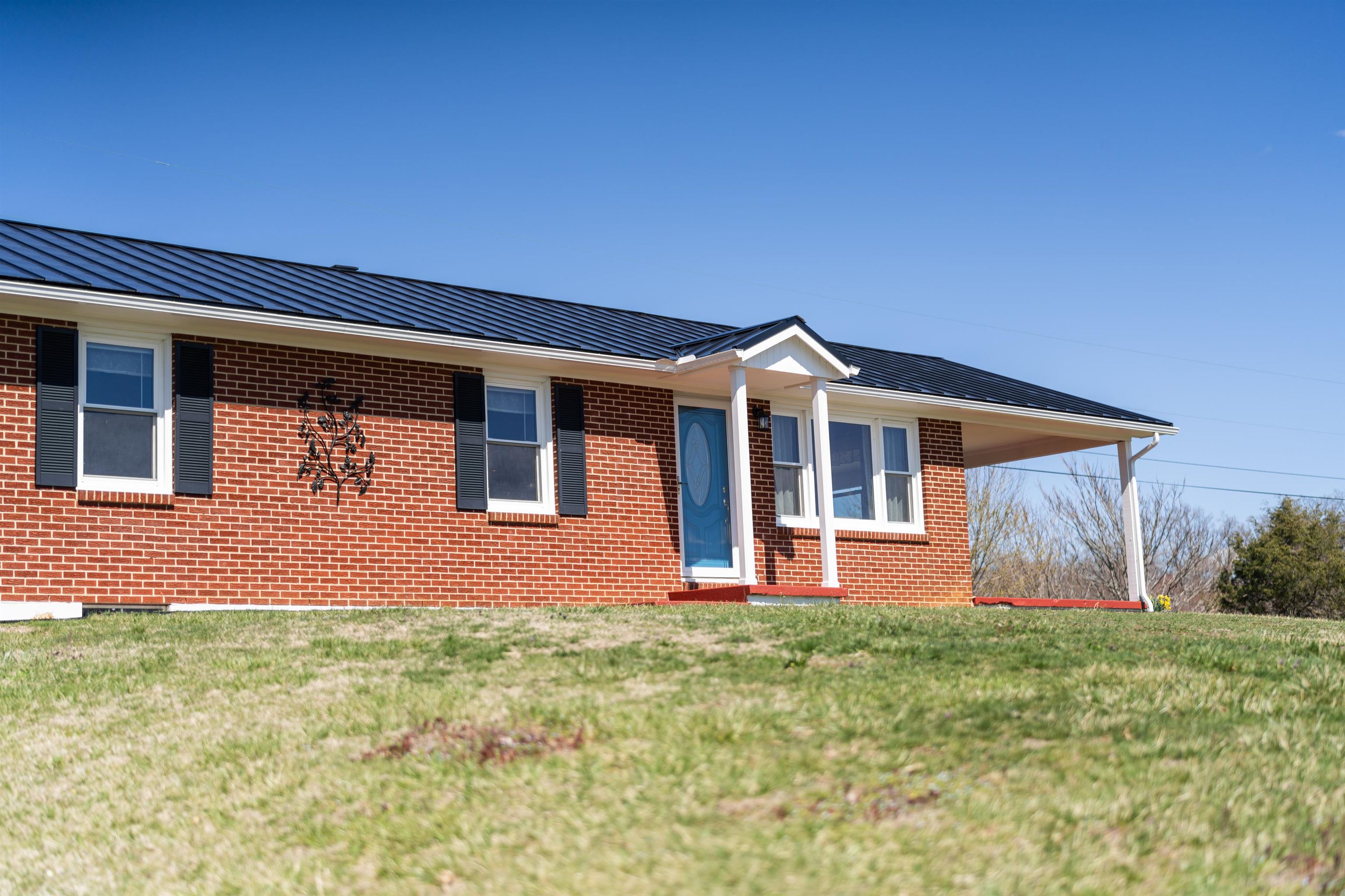 899 Timber Ridge Road Fairfield, VA 24435 - Photo 10 of 65 a front view of a house with garden