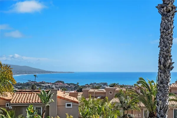a view of a city with tall buildings in ocean