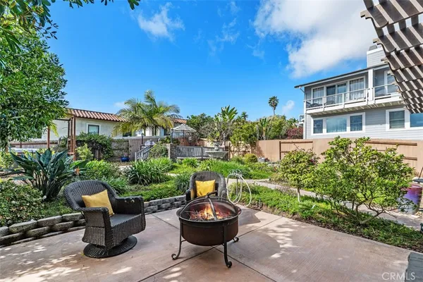 a backyard of a house with a seating space