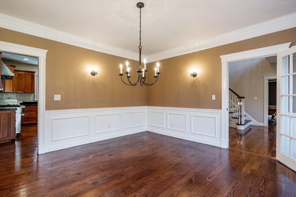 50 Corn Road Bolton, MA 01740 - Photo 12 of 40 a view of empty room with wooden floor