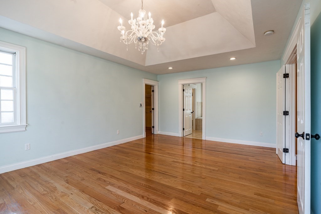 50 Corn Road Bolton, MA 01740 - Photo 20 of 40 wooden floor in an empty room with a window
