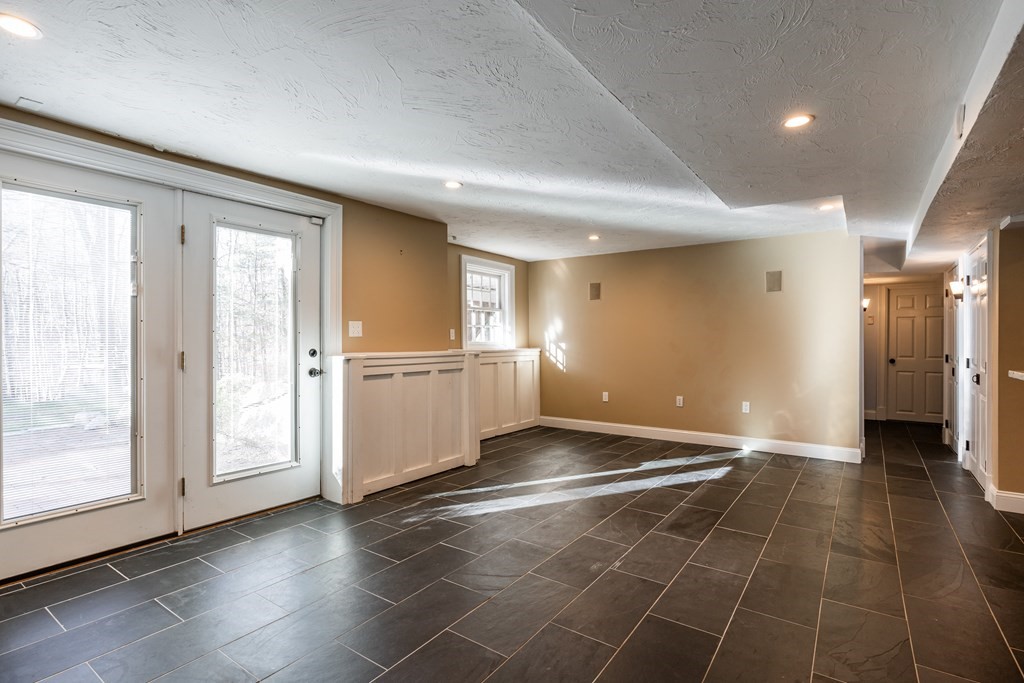 50 Corn Road Bolton, MA 01740 - Photo 35 of 40 a view of a livingroom with a kitchen