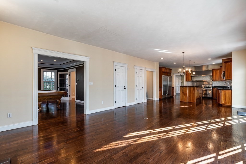 50 Corn Road Bolton, MA 01740 - Photo 7 of 40 a view of a living room and kitchen