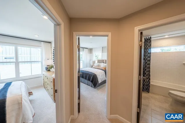 a view of a bedroom from a hallway