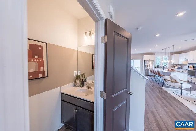 a view of a bathroom from the hallway