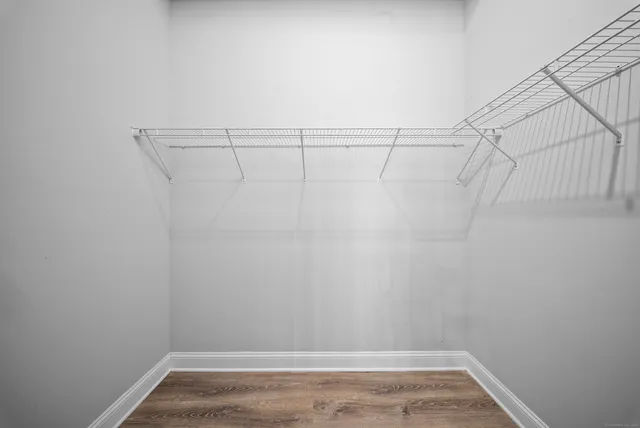 a view of a room with racks on the wall