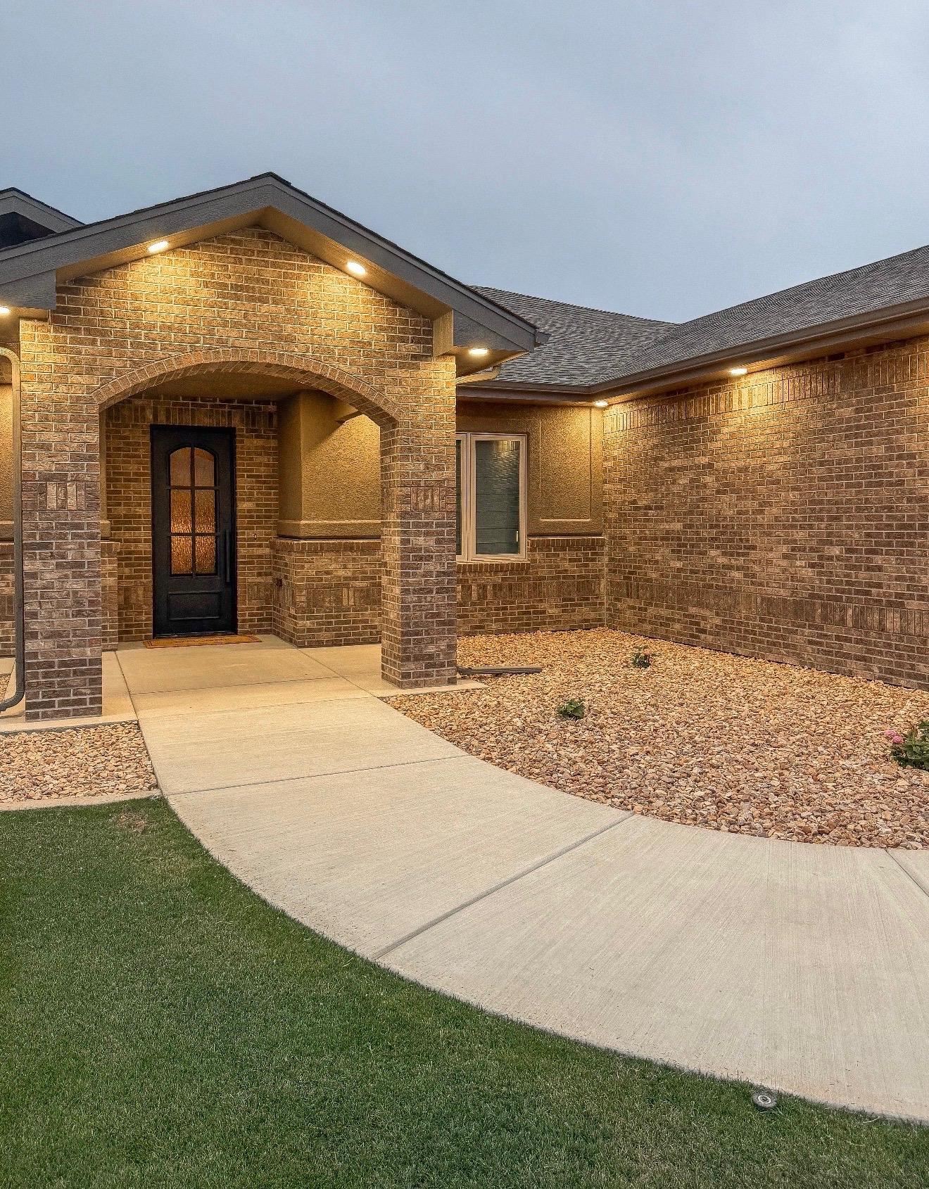 2639 Emerald Ridge Lane Grand Junction, CO 81506 - Photo 3 of 39 a front view of house with yard