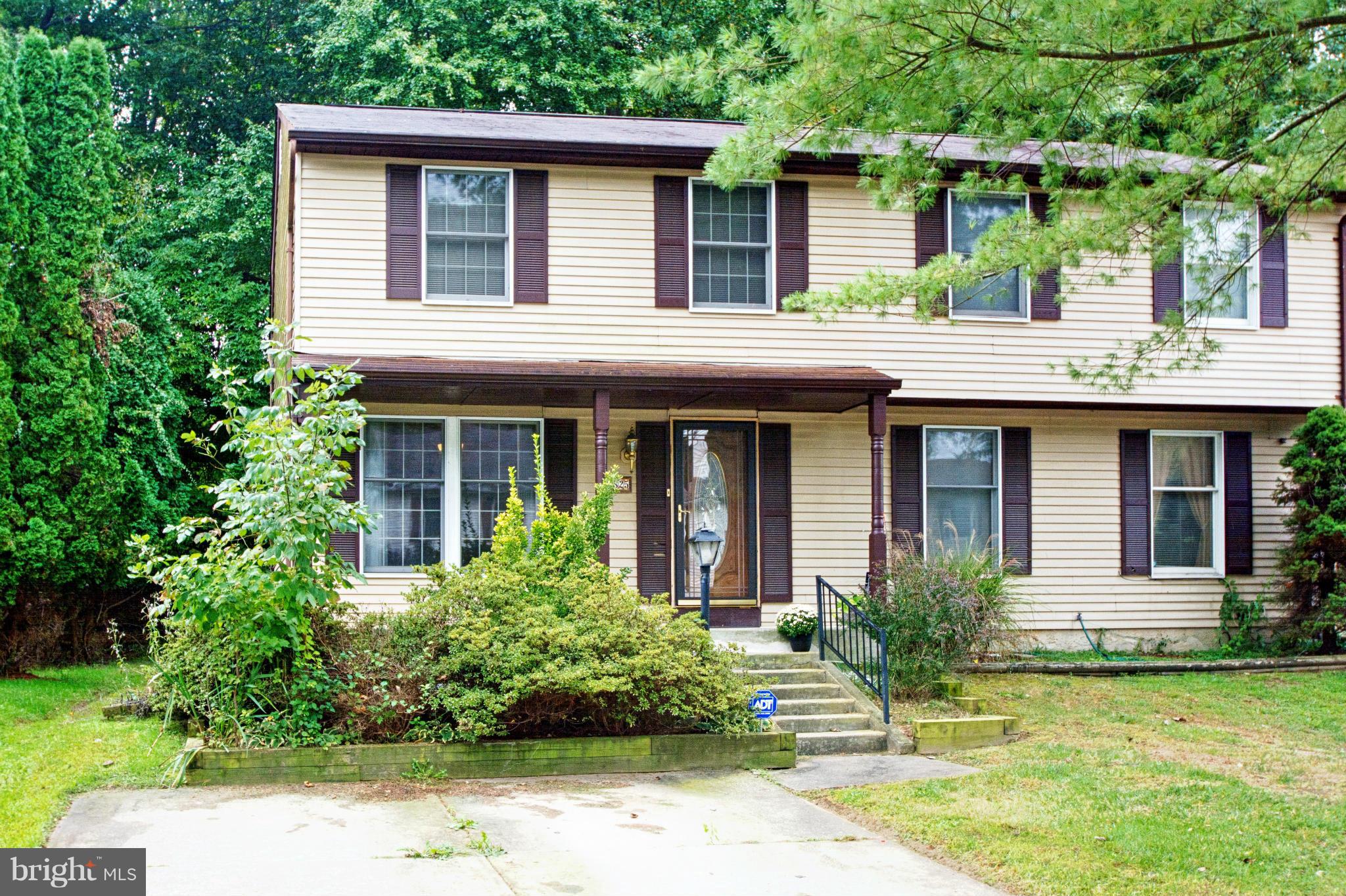 4825 Hawksbury Road Baltimore, MD 21208 - Photo 1 of 29 front view of a house with a yard