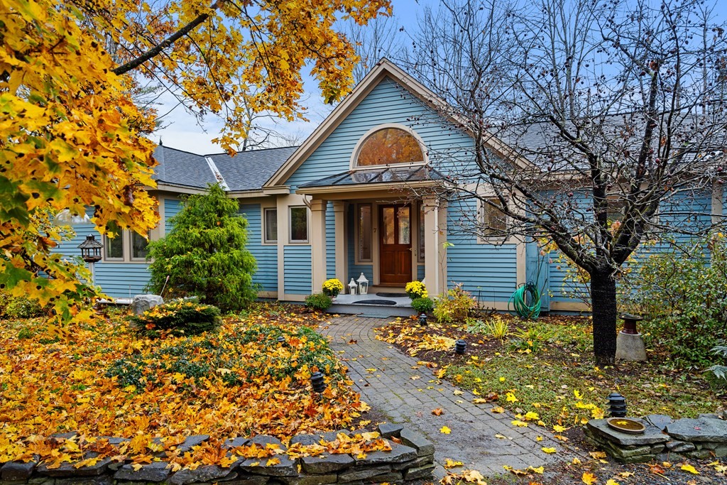 7 Par Brae Grantham, NH 03753 - Photo 1 of 42 a front view of a house with garden