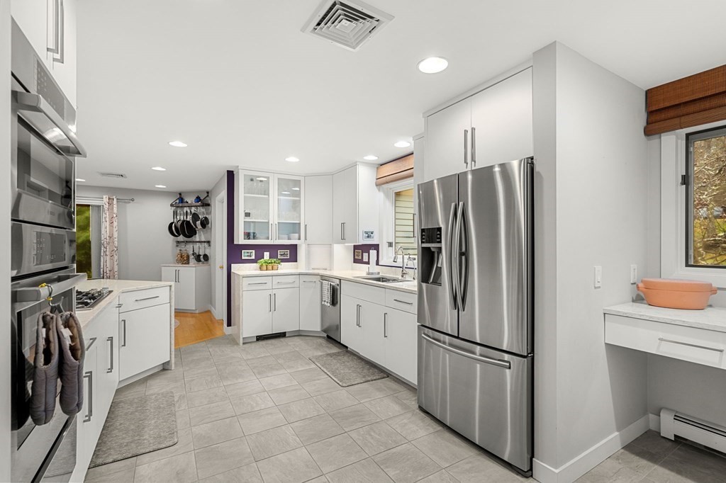 7 Par Brae Grantham, NH 03753 - Photo 13 of 42 a kitchen with stainless steel appliances a refrigerator sink and cabinets