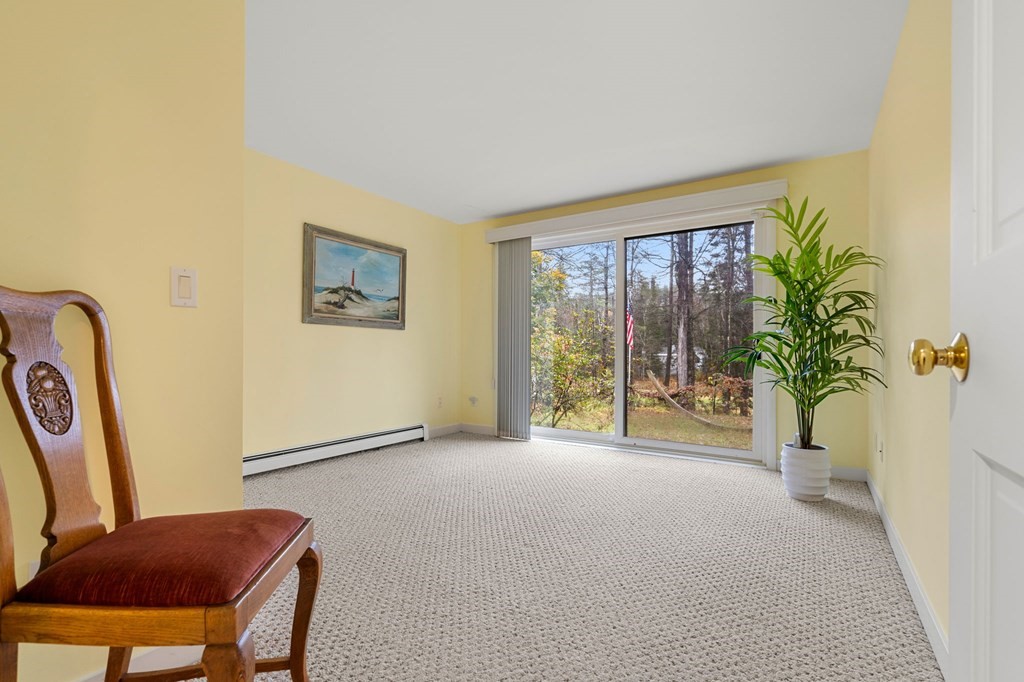 7 Par Brae Grantham, NH 03753 - Photo 28 of 42 a view of a livingroom with furniture and a potted plant