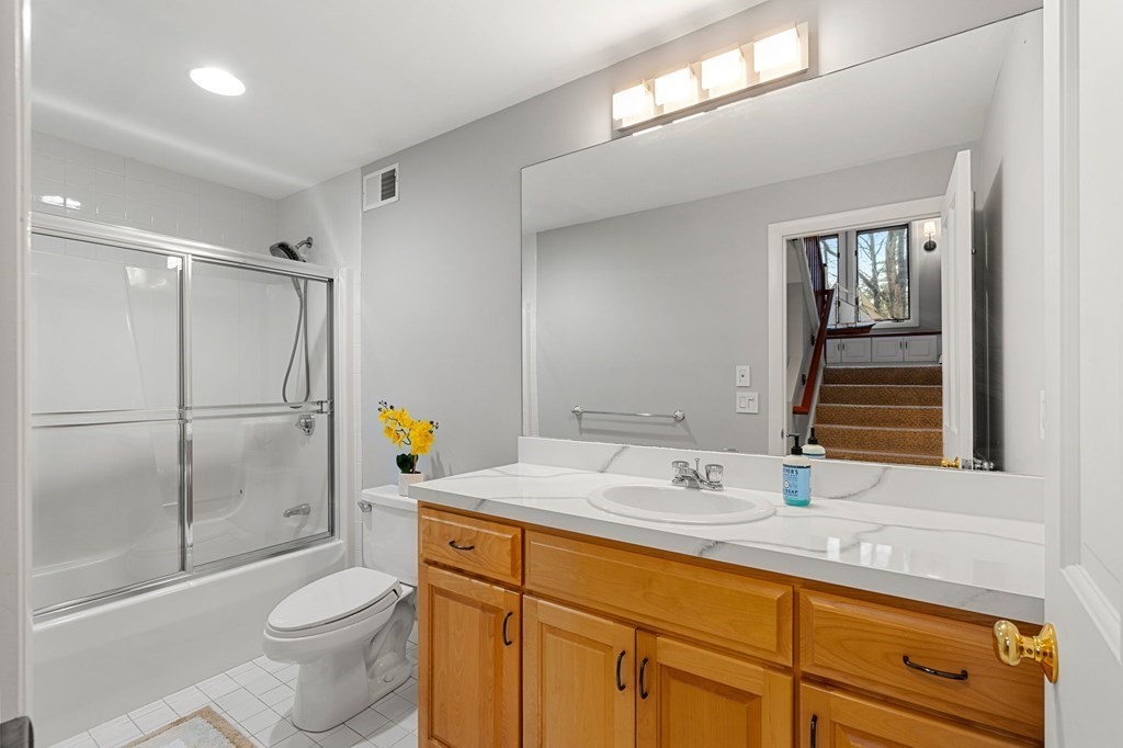 7 Par Brae Grantham, NH 03753 - Photo 32 of 42 a bathroom with a granite countertop sink toilet and shower