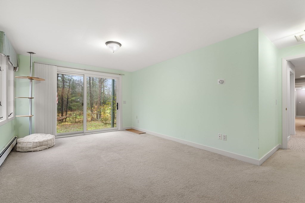 7 Par Brae Grantham, NH 03753 - Photo 33 of 42 a view of an empty room with a sliding door